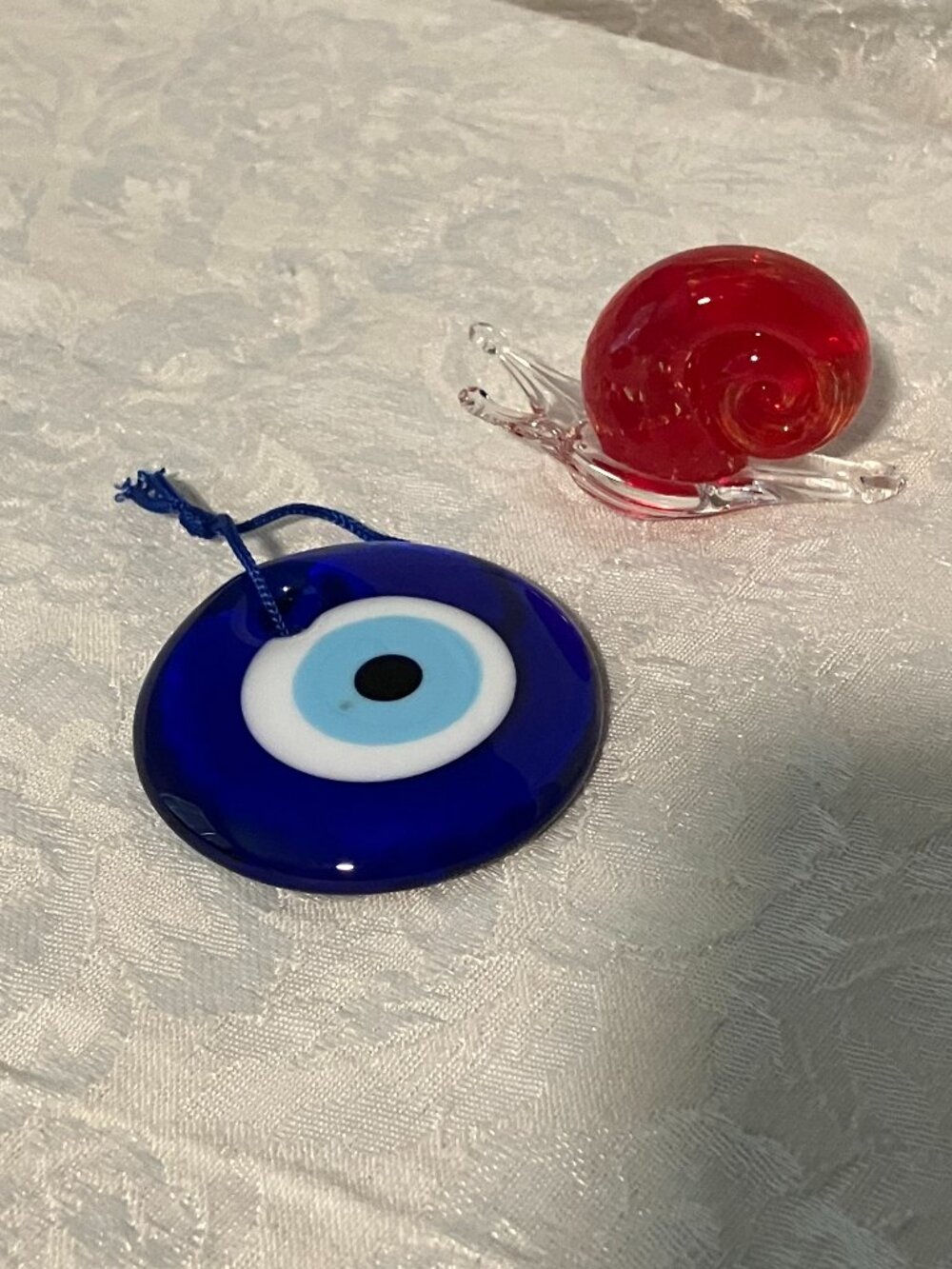 Glass all seeing eye and a snail